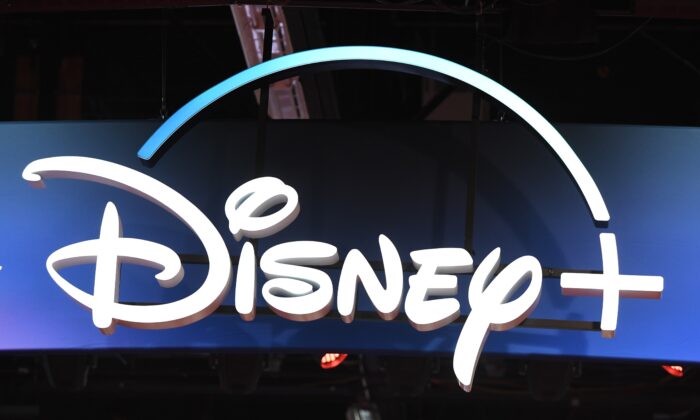 A Disney+ streaming service sign is pictured at the D23 Expo, billed as the "largest Disney fan event in the world," at the Anaheim Convention Center in Anaheim, Calif., on Aug. 23, 2019. (Robyn Beck/AFP via Getty Images)