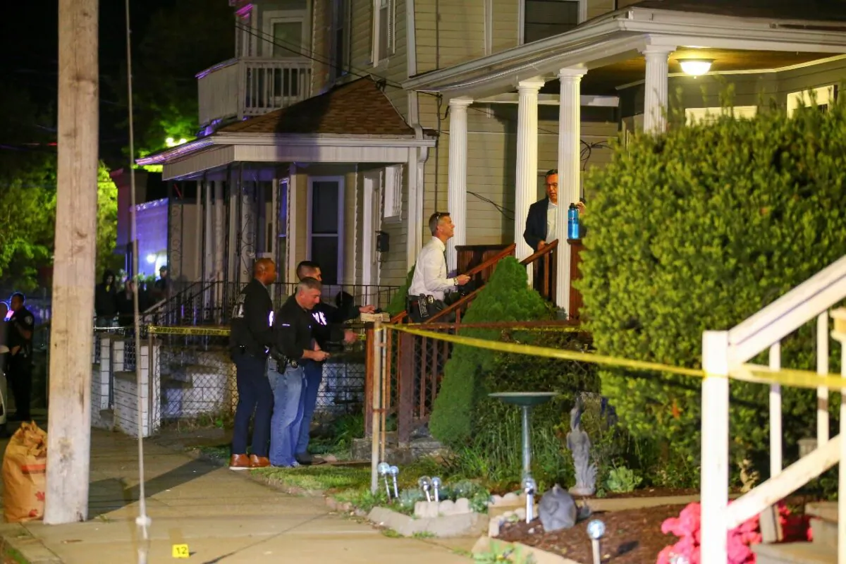 Providence Police investigate a shooting on Carolina Avenue, late Thursday, in Providence, R.I., on May 13, 2021. (Stew Milne/AP Photo)