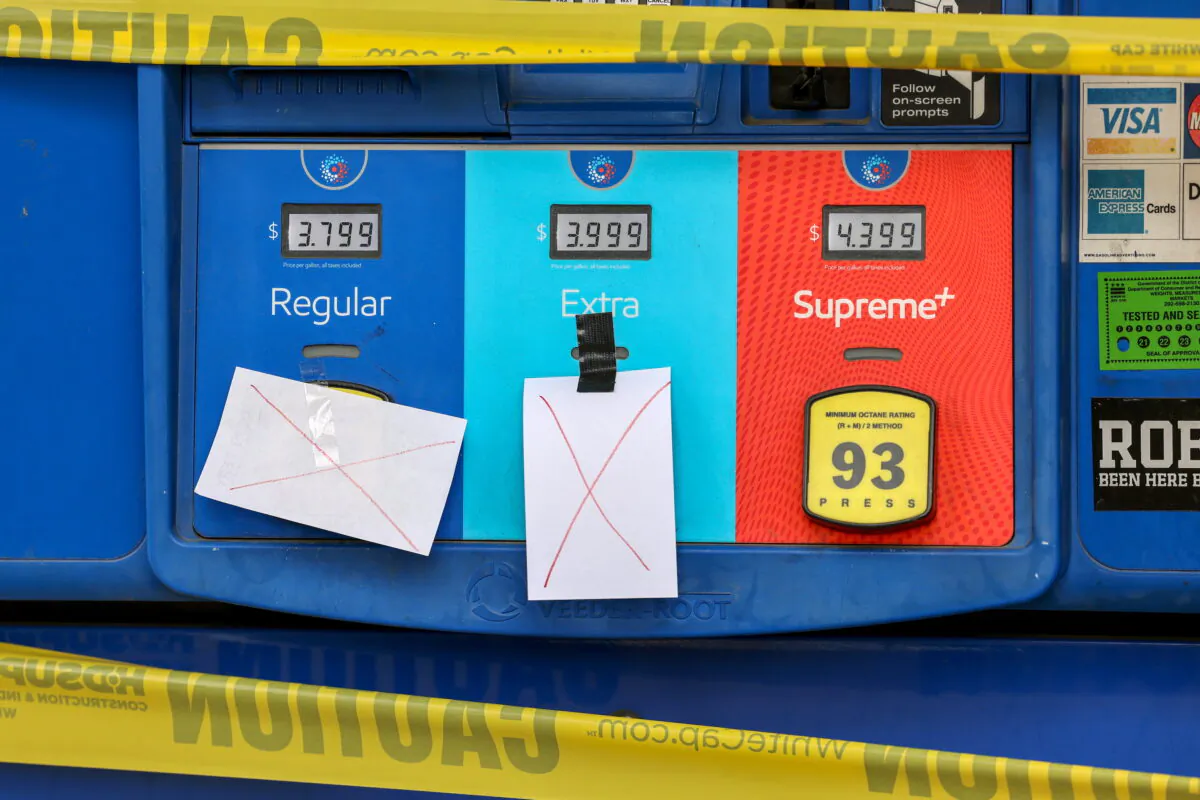 Gas pumps are roped off with a tape indicating a lack of gasoline at a gas station in Washington, on May 14, 2021. (Evelyn Hockstein/Reuters)