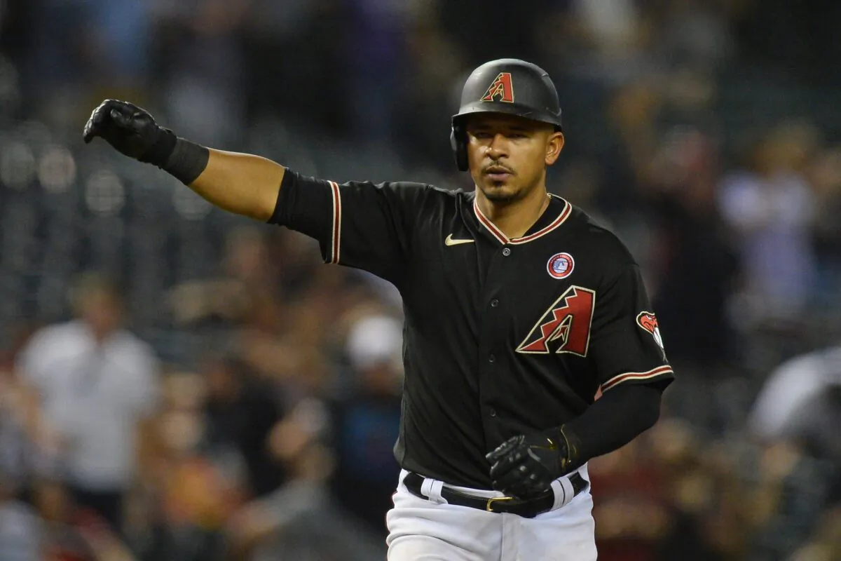Arizona Diamondbacks third baseman Eduardo Escobar (5) celebrates after hitting a two run home run against the Washington Nationals during the eighth inning at Chase Field, on May 15, 2021. (Joe Camporeale/USA TODAY Sports via Reuters)