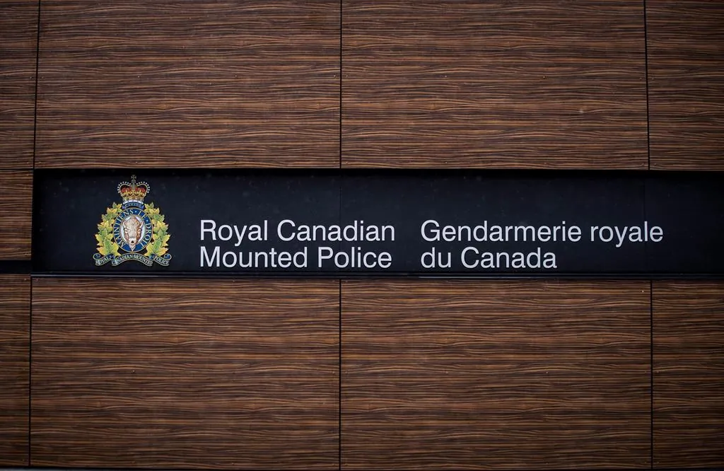 The RCMP logo on a building in a file photo. (Darryl Dyck / The Canadian Press)