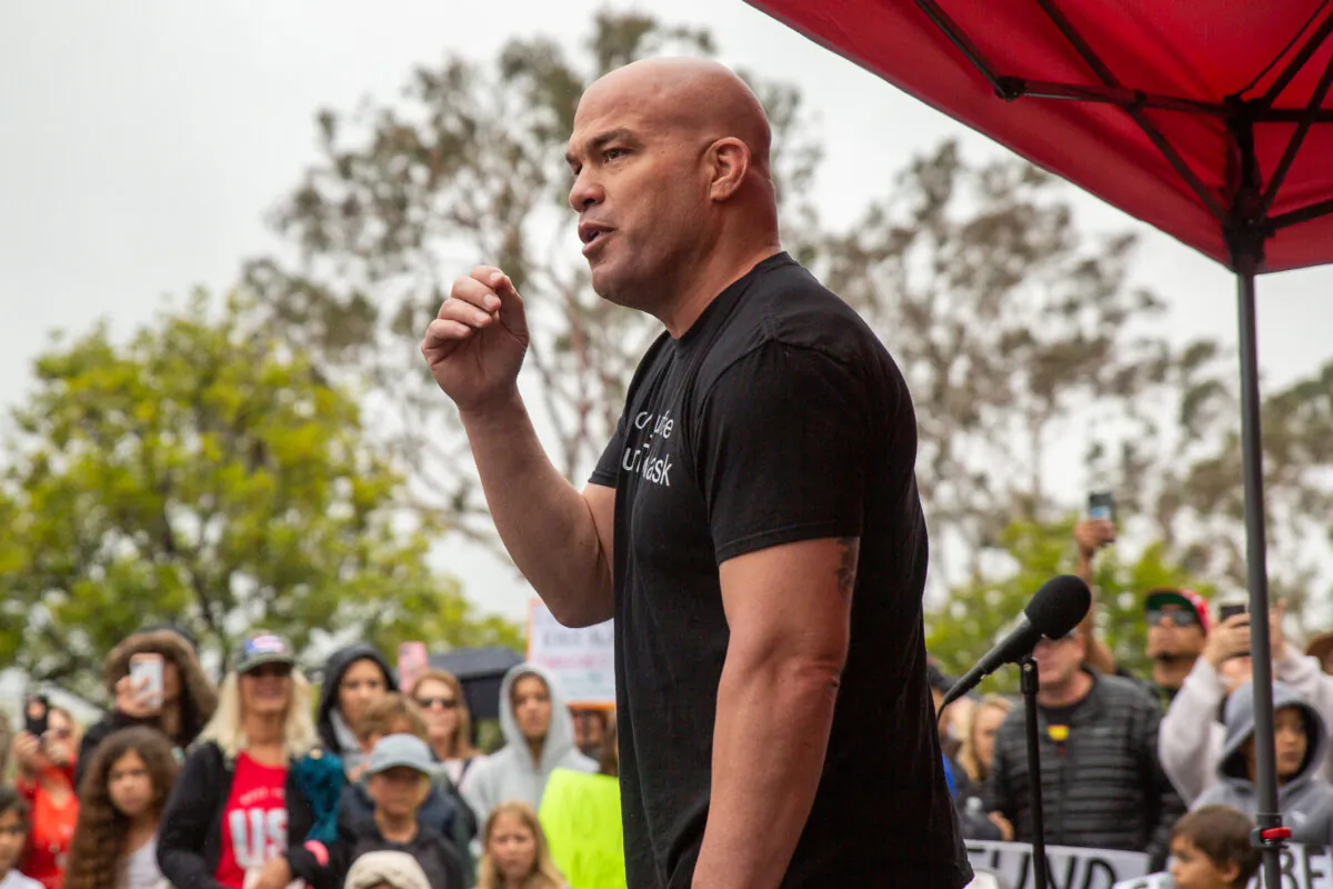 Former Huntington Beach Mayor Pro Tem Tito Ortiz speaks to parents and students as they gather in protest of wearing masks in schools outside The Orange County Board of Education in Costa Mesa, Calif., on May 17, 2021. (John Fredricks/The Epoch Times)