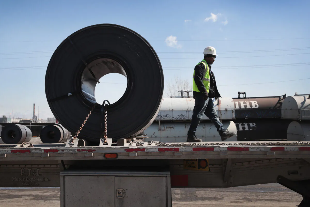 Steel is loaded onto a truck for shipping at the NLMK Indiana steel mill in Portage, Indiana, on March 15, 2018. (Scott Olson/Getty Images)