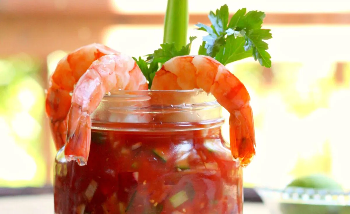 Drape freshly poached and chilled shrimp over a shrimp cocktail-inspired gazpacho for a light spring or summer meal. (Lynda Balslev for Tastefood)