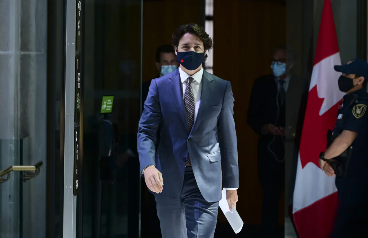 Prime Minister Justin Trudeau makes his way to hold a press conference in Ottawa on May 18, 2021. (Sean Kilpatrick/The Canadian Press)
