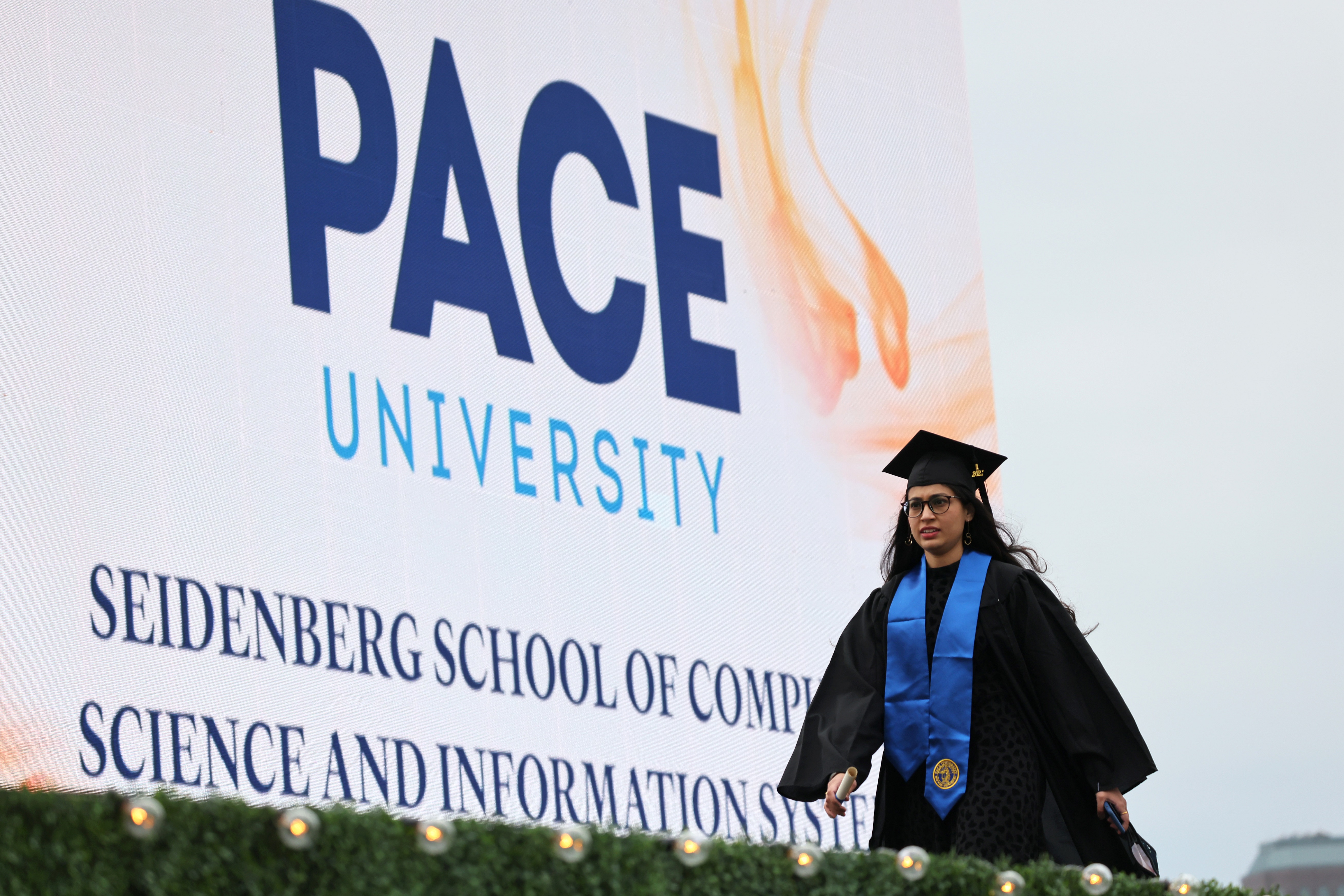 New York City's Pace University Holds Small In Person Graduation Ceremony At South Street Seaport