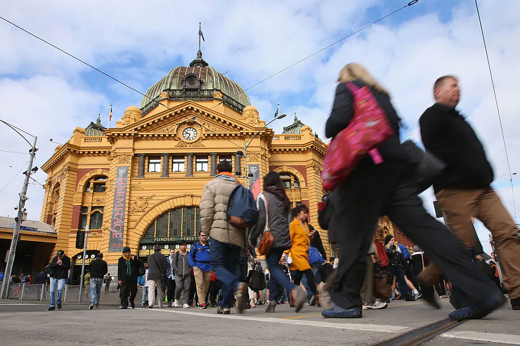 Commuters leave and arrive at Flinders Street Station in Melbourne, Australia, on Sept. 4, 2015. (Michael Dodge/Getty Images)
