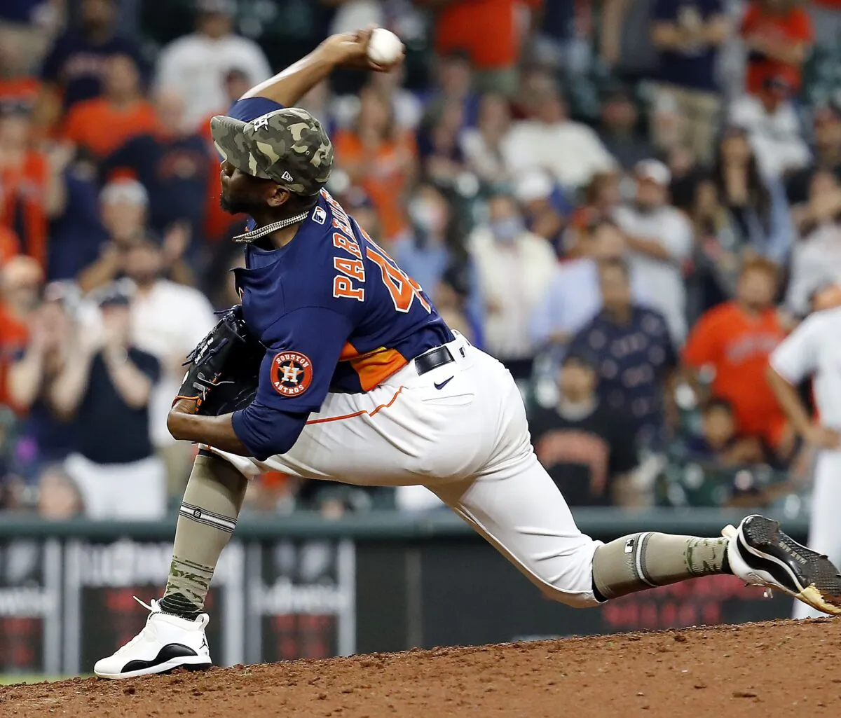 Enoli Paredes #48 of the Houston Astros pitches in the ninth inning against the Texas Rangers at Minute Maid Park in Houston, Texas, on May 16, 2021. (Bob Levey/Getty Images)