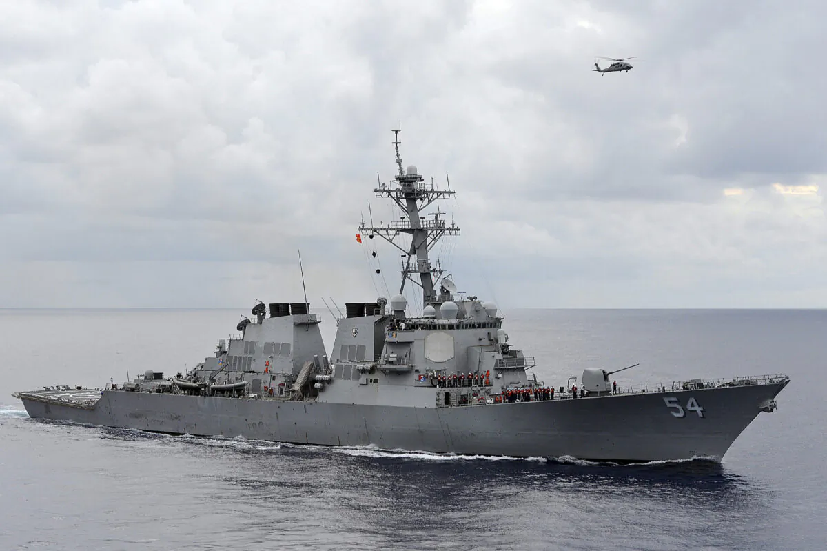The U.S. Navy guided-missile destroyer USS Curtis Wilbur patrols in the Philippine Sea on Aug. 15, 2013. (U.S. Navy/Mass Communication Specialist 3rd Class Declan Barnes/Handout via Reuters)