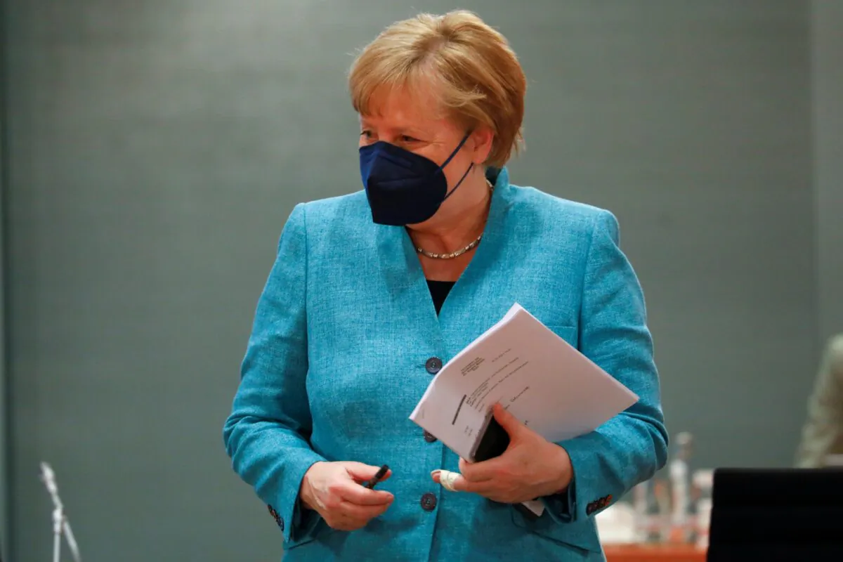 German Chancellor Angela Merkel arrives for the weekly cabinet meeting at the Chancellery in Berlin, Germany, on May 19, 2021. (Michele Tantussi/Pool/Reuters)