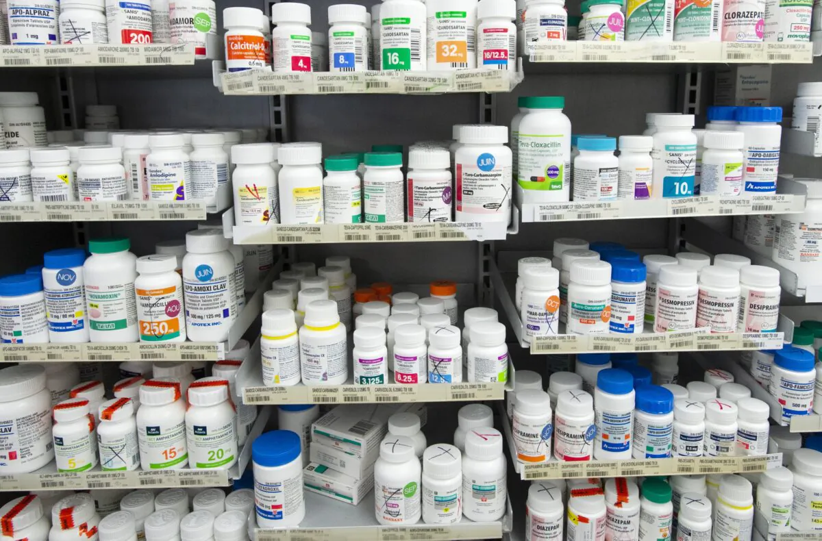 Prescription drugs are seen on shelves at a pharmacy in Montreal on March 11, 2021. (Ryan Remiorz/The Canadian Press)
