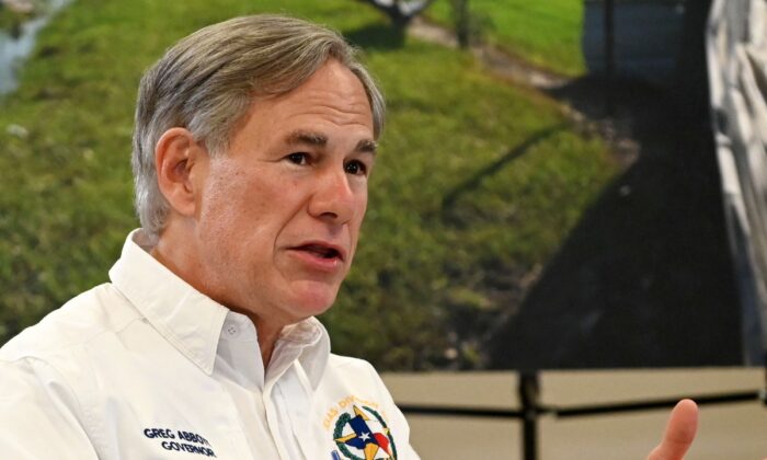 Texas Governor Greg Abbott attends a briefing in Orange, Texas, on Aug. 29, 2020. (Roberto Schmidt/AFP via Getty Images)