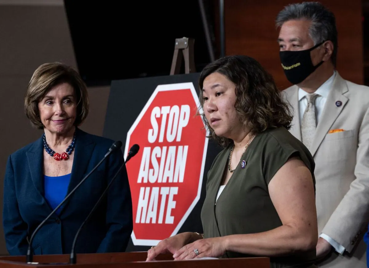 House Speaker Nancy Pelosi (D-Calif.) looks on as Rep. Grace Meng (D-N.Y.) speaks during a news conference with House Democrats and the Congressional Asian Pacific American Caucus on the "Covid-19 Hate Crimes Act" on Capitol Hill in Washington on May 18, 2021. (Andrew Caballero-Reynolds/AFP via Getty Images)