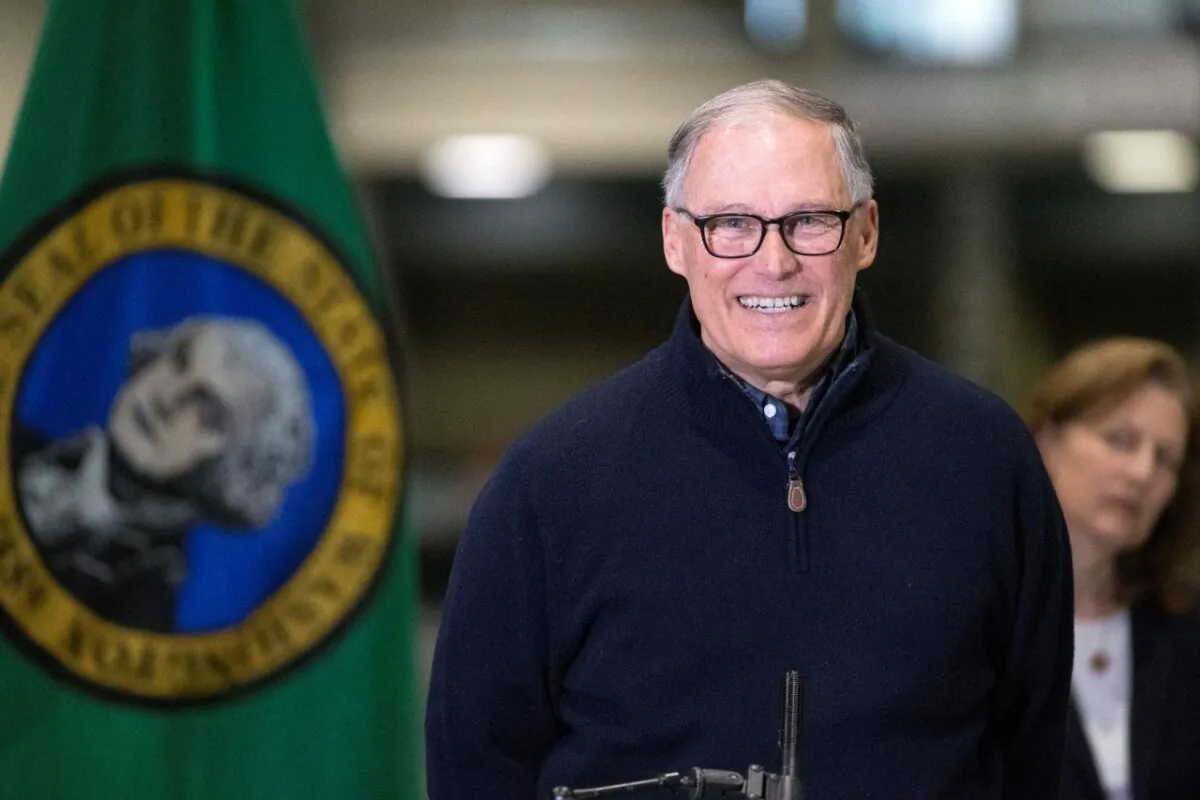 Washington State Gov. Jay Inslee and other leaders speak to the press in Seattle, Wash., on March 28, 2020. (Karen Ducey/Getty Images)
