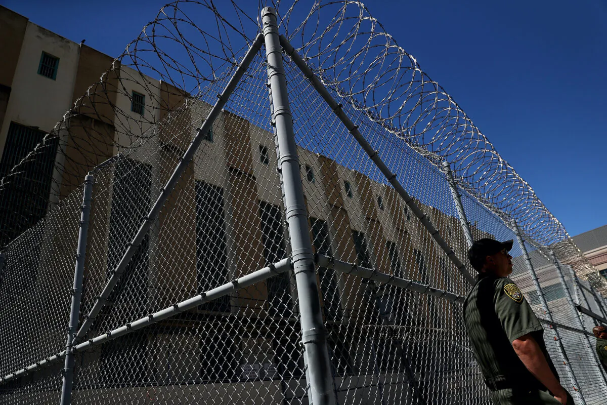 An armed California Department of Corrections and Rehabilitation (CDCR) officer stands guard at San Quentin State Prison, California, on Aug. 15, 2016. (Justin Sullivan/Getty Images)