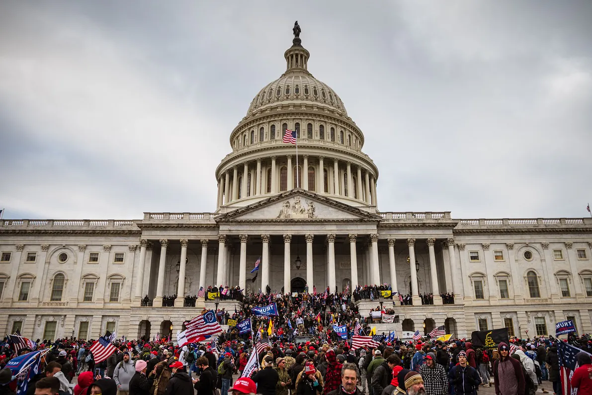 A large group of protesters stand on the east steps of the Capitol Building in Washington on Jan. 6, 2021. (Jon Cherry/Getty Images)