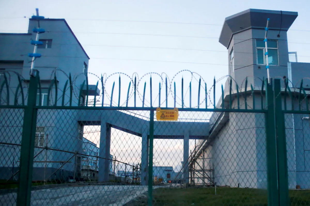 A perimeter fence around what is officially known as a vocational skills education center in Dabancheng, in the Xinjiang Uyghur region of China, on Sept. 4, 2018. (Thomas Peter/Reuters)