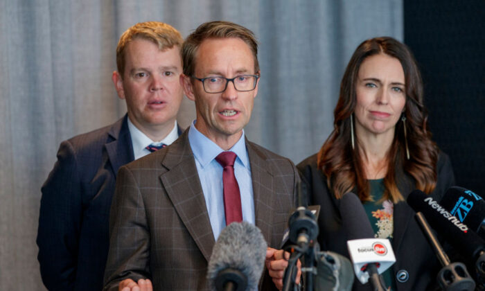 (L to R) Minister for COVID-19 Response Chris Hipkins, Director-General of Health Ashley Bloomfield, and New Zealand Prime Minister Jacinda Ardern at a press conference announcing the arrival of the Pfizer/BioNTech vaccine in Auckland, New Zealand on Feb. 12, 2021. (Dave Rowland/Getty Images)