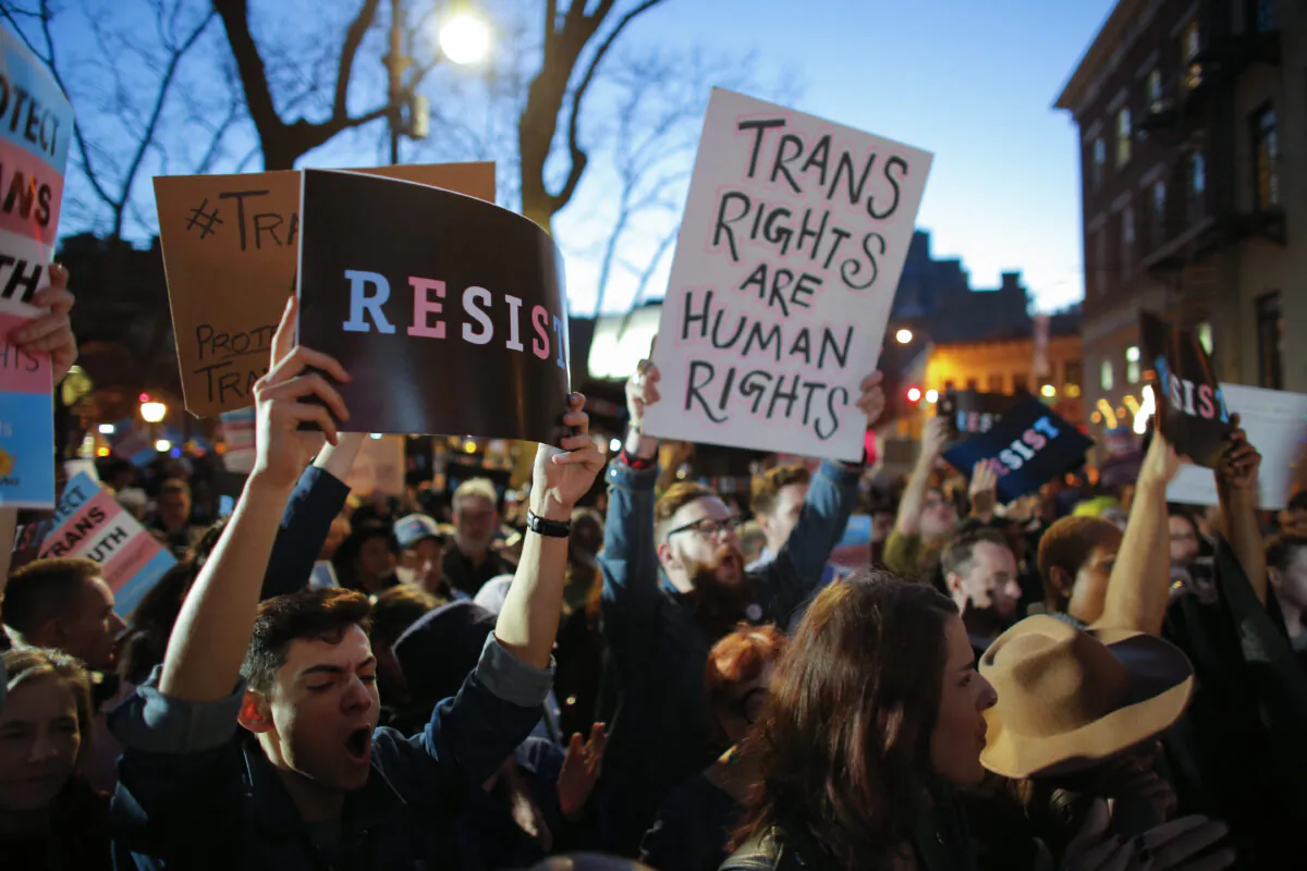 People take part in a rally to support transgender causes in the Greenwich Village area of New York on Feb. 23, 2017. (Kena Betancur/AFP via Getty Images)