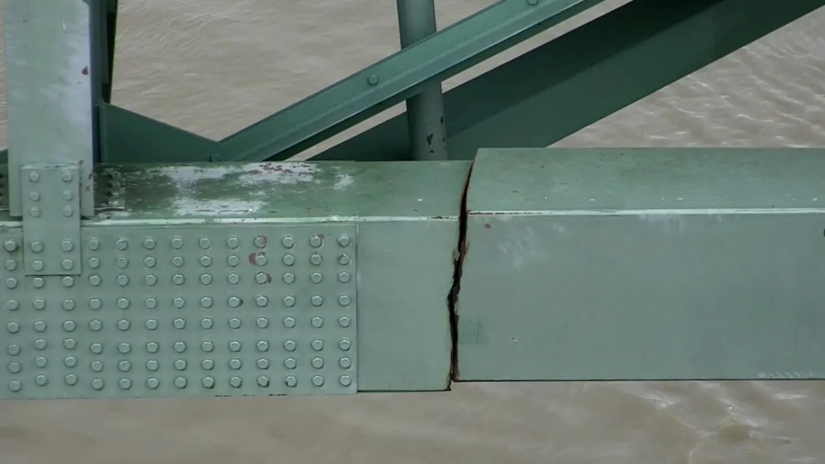This undated photo released by the Tennessee Department of Transportation shows a crack in a steel beam on the Interstate 40 bridge, near Memphis, Tenn. An inspector who failed to discover the crack in the bridge linking Arkansas and Tennessee that prompted the span's closure has been fired. (Tennessee Department of Transportation via AP, File)