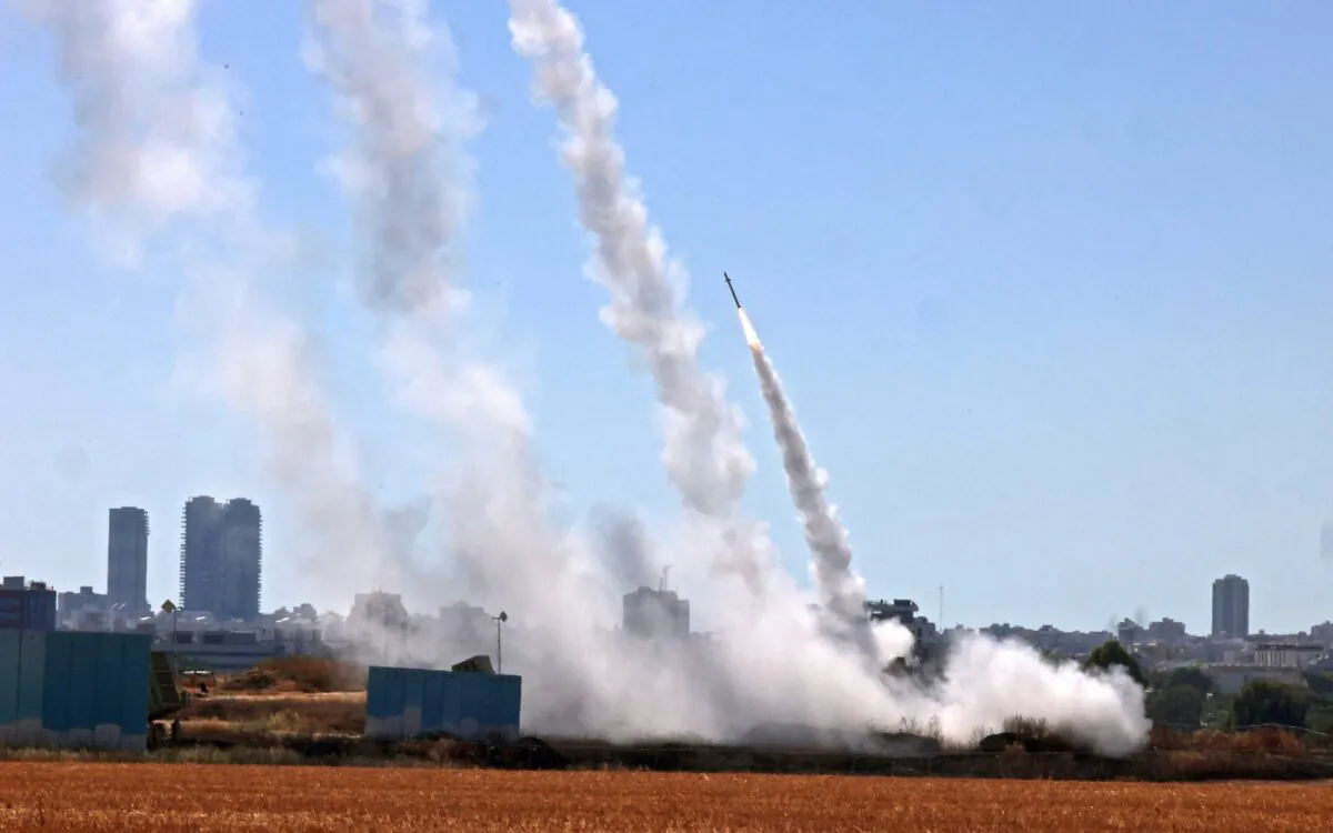 Israel's Iron Dome aerial defense system is activated to intercept a rocket launched from the Gaza Strip, controlled by the Palestinian Hamas movement, above the southern Israeli city of Ashdod, on May 12, 2021. (Emmanuel Dunand/AFP via Getty Images)