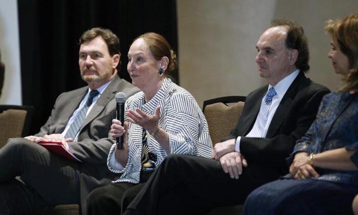 Supreme Court of Canada Chief Justice Richard Wagner, left, and fellow judges Michael Moldaver, second from right, and Andromache Karakatsanis, right, listen in as judge Rosalie Abella responds to a question during a question-and-answer session at Canadian Museum of Human Rights, in Winnipeg, on Sept. 25, 2019. Abella heard her last Supreme Court case Friday. (John Woods/The Canadian Press)