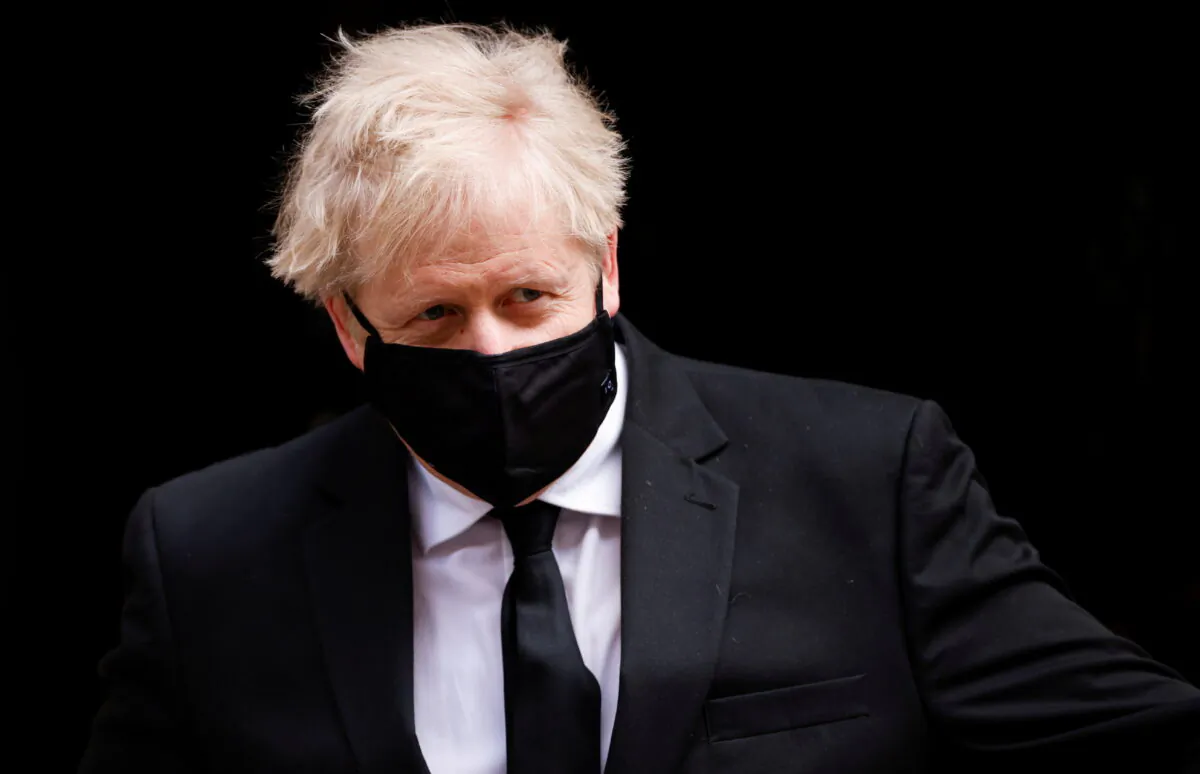 Britain's Prime Minister Boris Johnson walks outside Downing Street, amid the coronavirus disease (COVID-19) pandemic, in London, Britain, April 14, 2021. (John Sibley/Reuters)