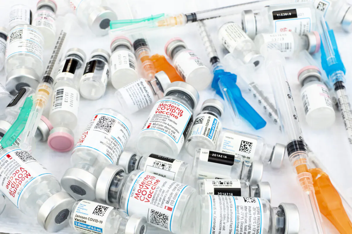 Bottles of the three current COVID-19 vaccines from Johnson & Johnson, Moderna, and Pfizer, with hypodermics needles, photographed at the COVID-19 vaccination site at Kedren Community Health Center, in Los Angeles, Calif., on May 13, 2021. (Jay L. Clendenin/Los Angeles Times/TNS)