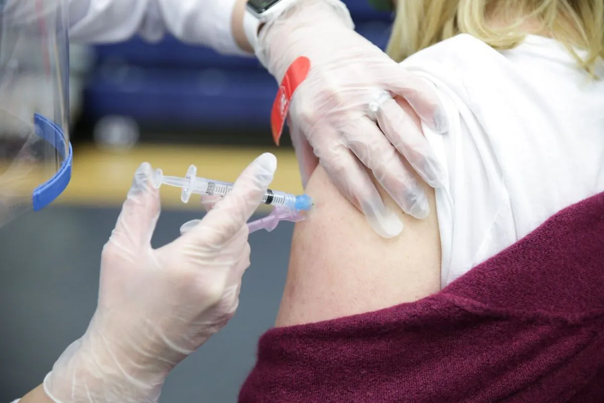 A person receives a COVID-19 vaccine in Dayton, Ohio, on Feb. 10, 2021. (Megan Jelinger/AFP via Getty Images)