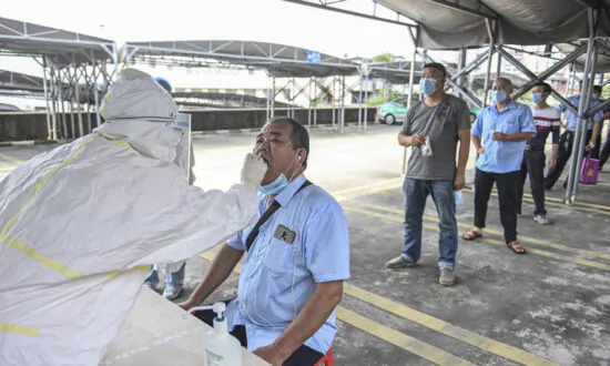 China Officially Reports COVID-19 Outbreak Has Spread to Southern Coastal Province Guangdong