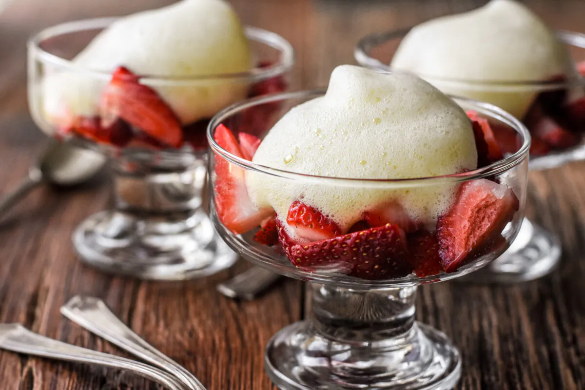 Warm, slightly sweet sabayon is a great dairy-free alternative to whipped cream on top of juicy seasonal fruits.