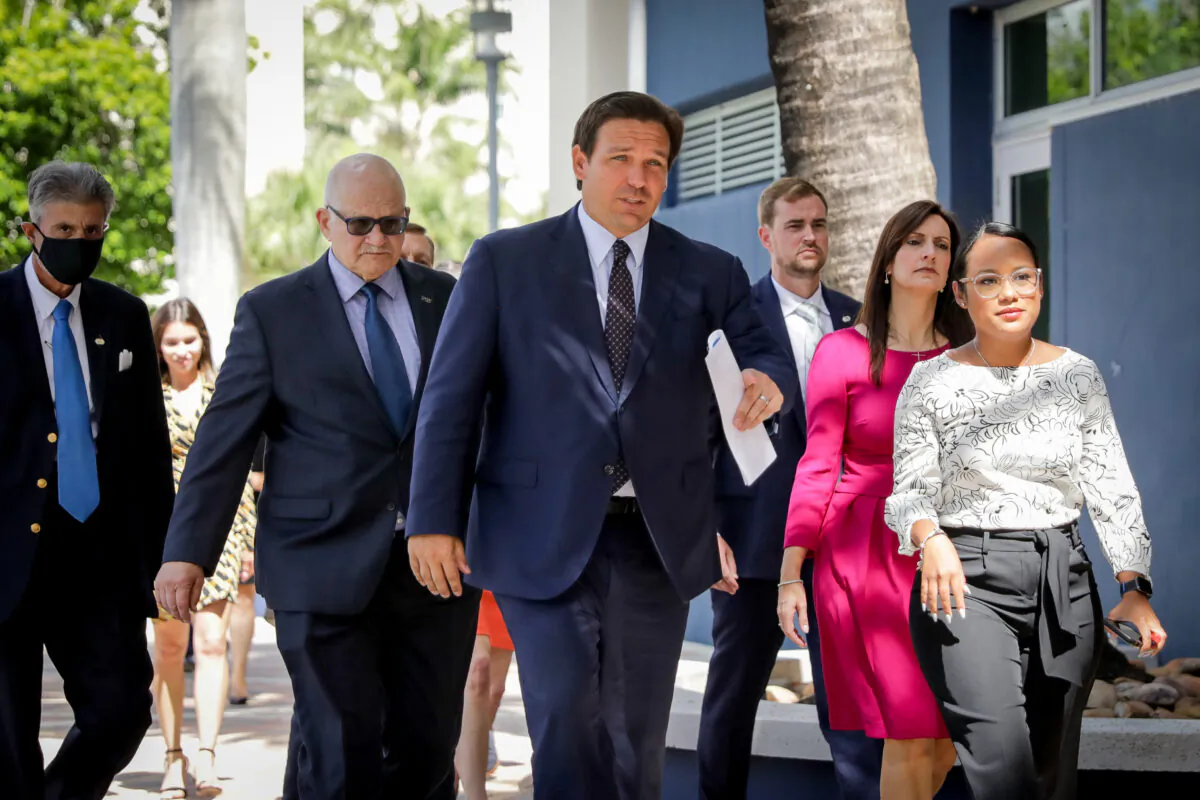 Florida Gov. Ron DeSantis arrives before signing into law Senate Bill 7072 at Florida International University in Miami on May 24, 2021. (Samira Bouaou/The Epoch Times)