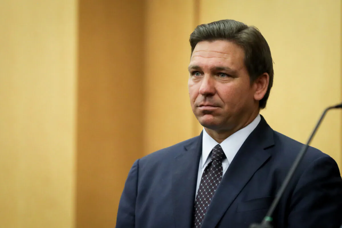 Florida Gov. Ron DeSantis speaks before signing Senate Bill 7072 into law at Florida International University in Miami on May 24, 2021. (Samira Bouaou/The Epoch Times)