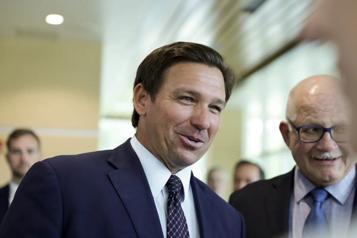 Florida Gov. Ron DeSantis departs after signing into law Senate Bill 7072 at Florida International University in Miami, Fla., on May 24, 2021. (Samira Bouaou/The Epoch Times)