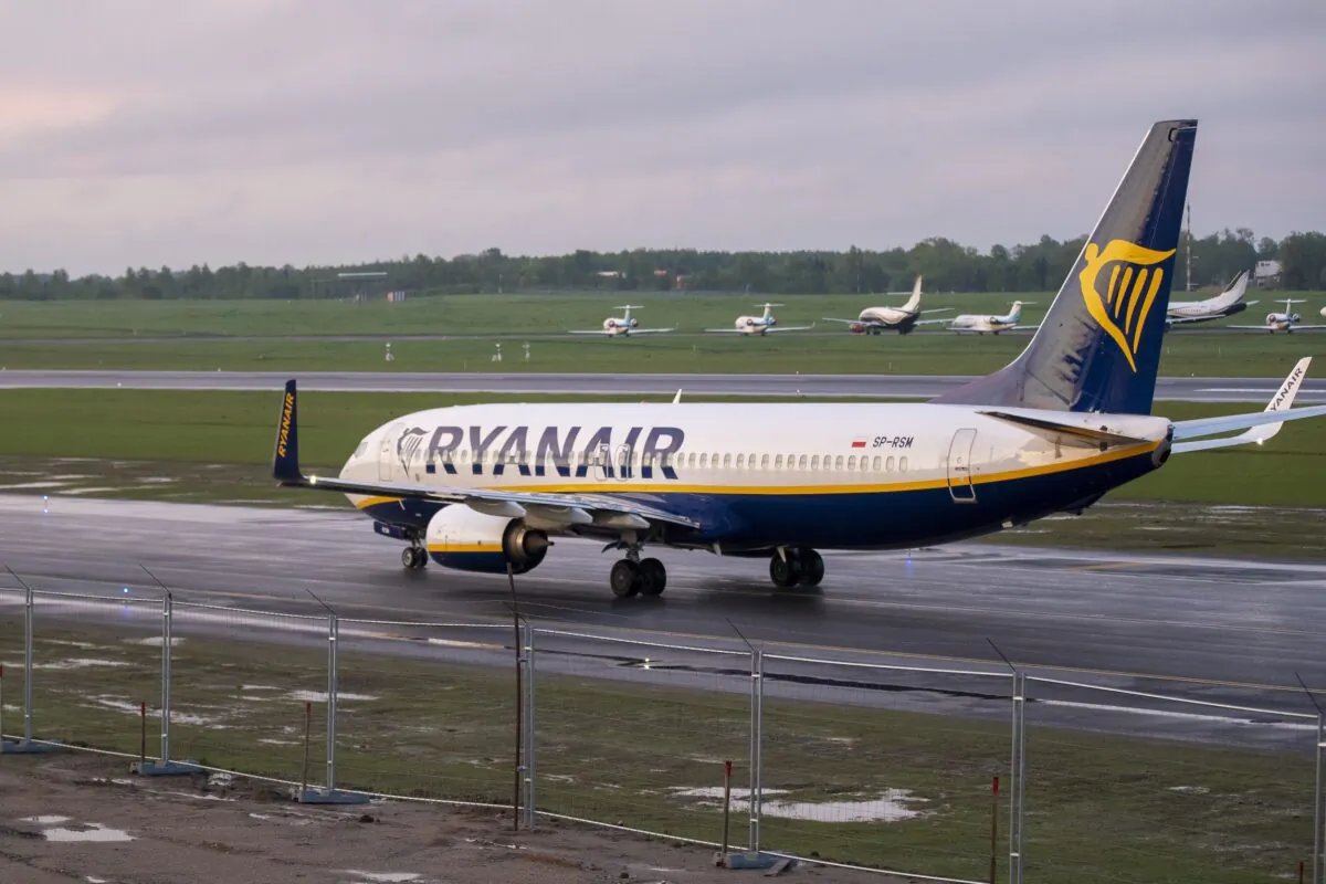 The Ryanair plane with registration number SP-RSM, carrying opposition figure Raman Pratasevich which was traveling from Athens to Vilnius and was diverted to Minsk after a bomb threat, lands at the International Airport outside Vilnius, Lithuania, on May 23, 2021. (Mindaugas Kulbis/AP Photo)