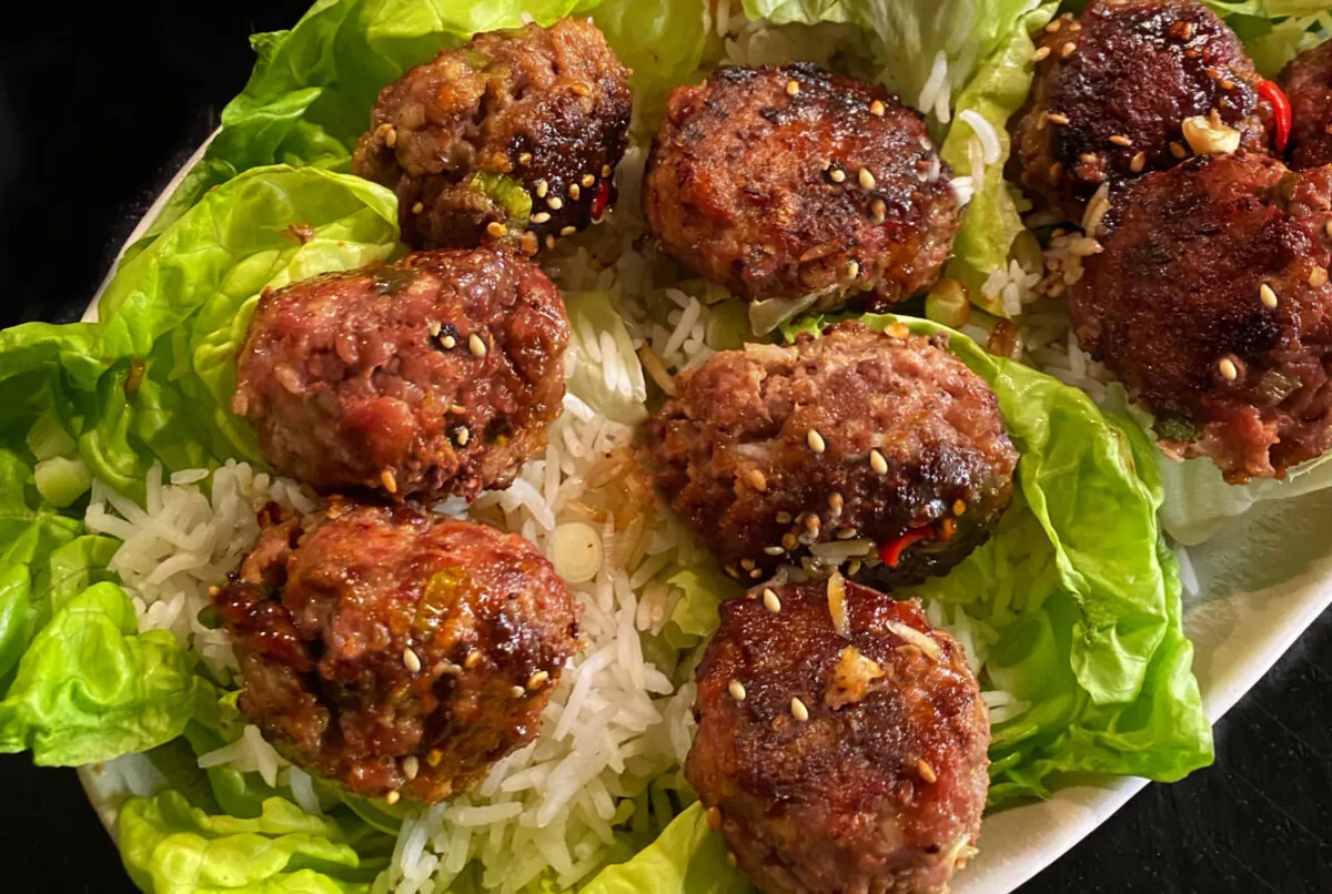 These meatball lettuce wraps are crisp and juicy, laced with ginger and spice. (Lynda Balslev for Tastefood)