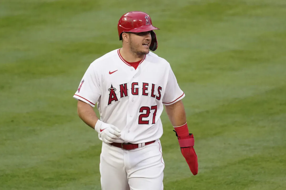 Los Angeles Angels' Mike Trout (27) walks back to first base during the first inning of a baseball game against the Cleveland Indians, in Los Angeles, Calif., on May 17, 2021. (Ashley Landis/AP Photo)