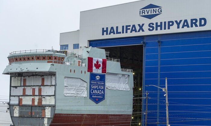 The centre block of the future HMCS Max Bernays is moved from the fabrication building to dockside at the Irving Shipbuilding facility in Halifax on Jan. 22, 2021.The vessel is Canada's third Arctic and Offshore Patrol Ship (AOPS) being built for the Royal Canadian Navy. The vessel is named for Max Bernays, who fought in the Battle of the Atlantic during the Second World War. Bernays was awarded the Conspicuous Gallantry Medal for his actions aboard HMCS Assiniboine 1942. (Andrew Vaughan/The Canadian Press)