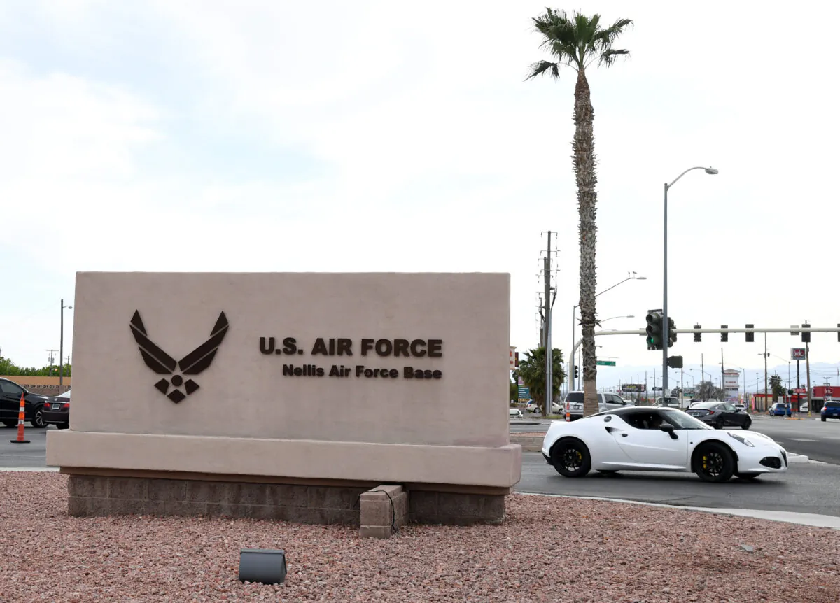 A sign near the main gate of Nellis Air Force Base in Las Vegas, Nev., is shown on April 3, 2020. (Ethan Miller/Getty Images)