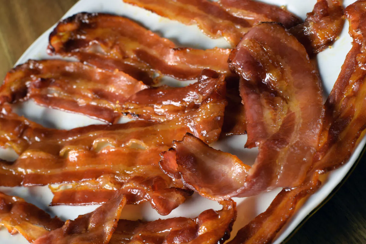 Applewood smoked bacon takes on another layer of sweet smoky deliciousness when glazed with brown sugar. (Dreamstime/TNS)