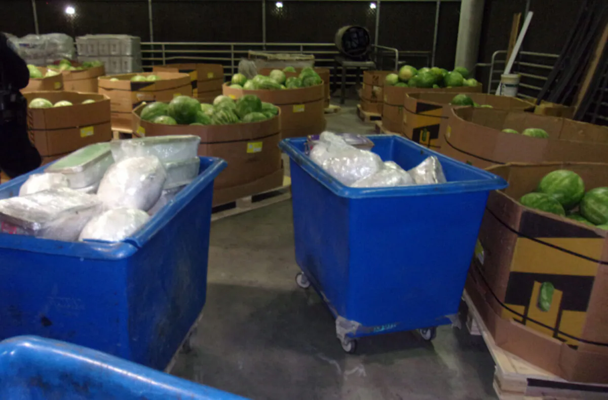 Plastic containers containing packages of methamphetamine are seized at Otay Mesa Commercial Facility in San Diego County, Calif., on May 18, 2021. (Courtesy of U.S. Customs and Border Protection)