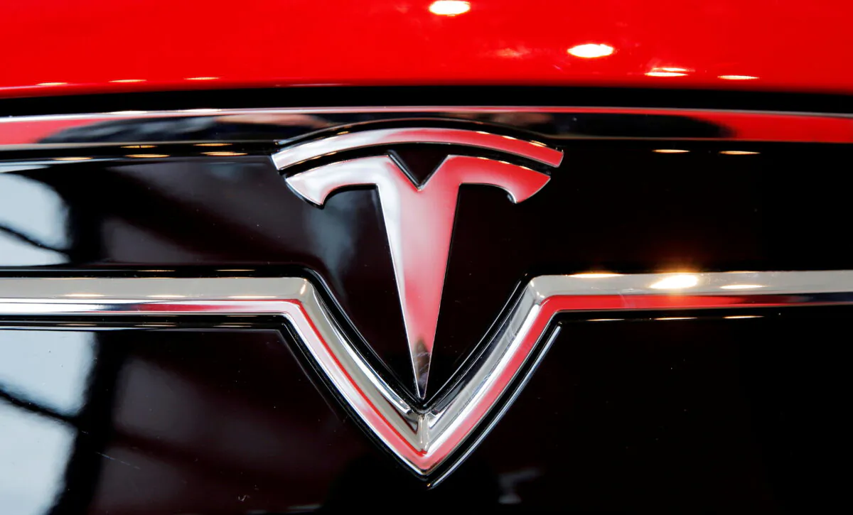 A Tesla logo on a Model S is photographed inside of a Tesla dealership in New York on April 29, 2016. (Lucas Jackson/Reuters)