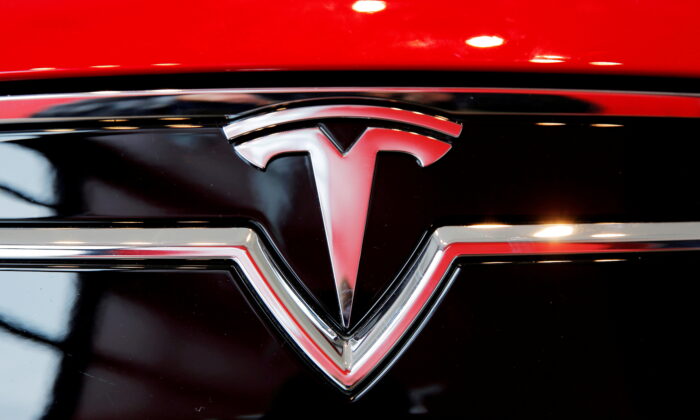 A Tesla logo on a Model S is photographed inside of a Tesla dealership in New York, on April 29, 2016. (Lucas Jackson/Reuters)