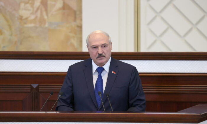 Belarusian President Alexander Lukashenko gives a speech during a meeting in Minsk
