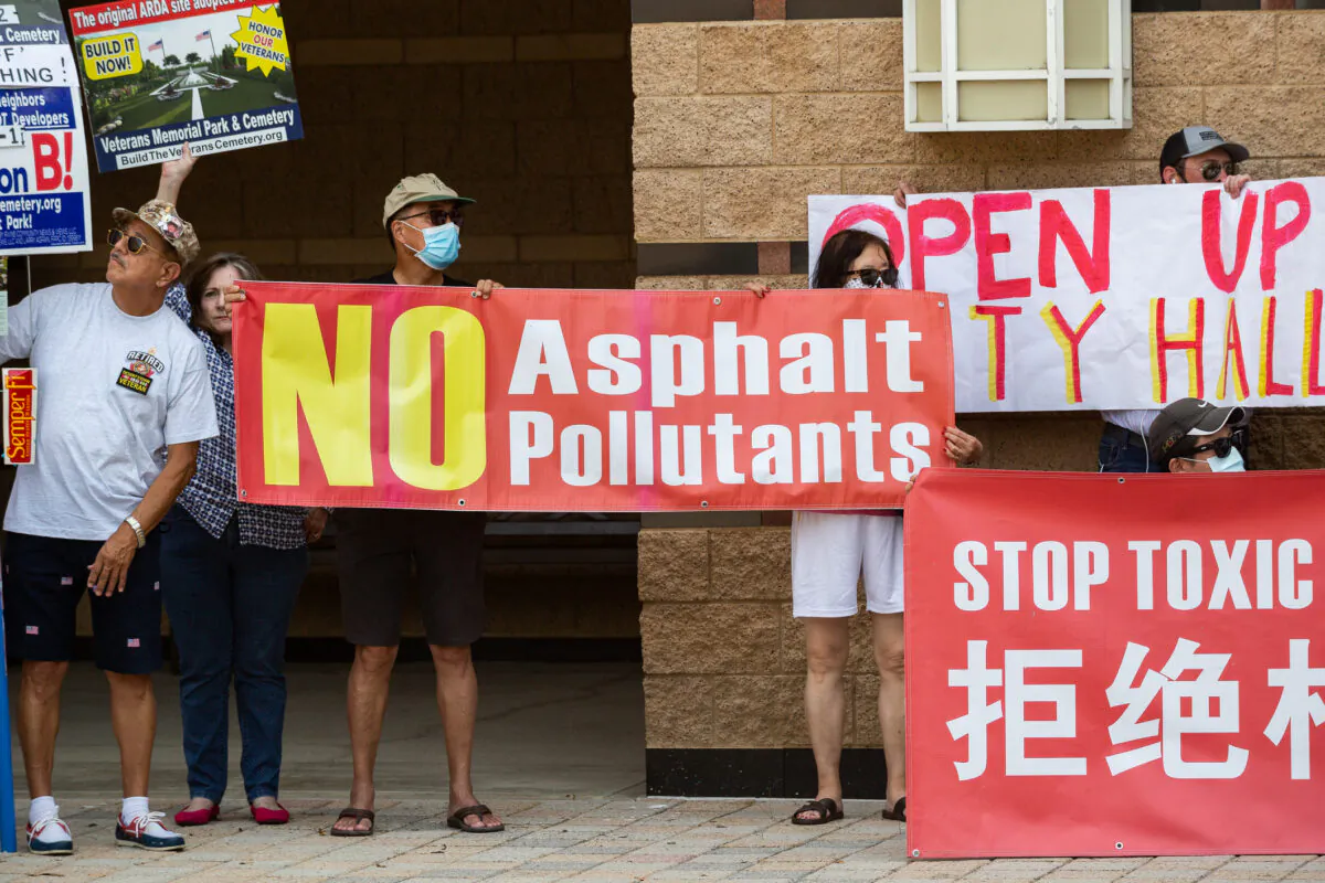 Irvine residents gather to rally for various issues in front of Irvine City Hall in Irvine, Calif., on May 25, 2021. (John Fredricks/The Epoch Times)