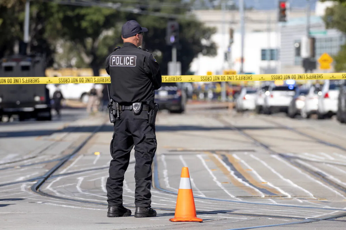 Police secure the scene of a mass shooting at a rail yard run by the Santa Clara Valley Transportation Authority in San Jose, Calif., on May 26, 2021.  (Peter DaSilva/Reuters)