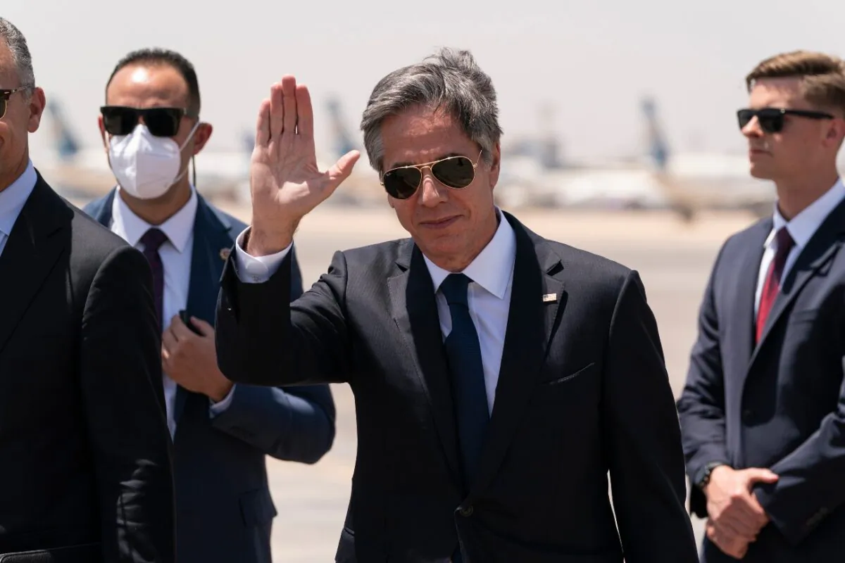Secretary of State Antony Blinken waves as he steps off his plane upon arrival at Cairo International Airport, in Cairo, Egypt, on May 26, 2021. (Alex Brandon/Pool/AP Photo)