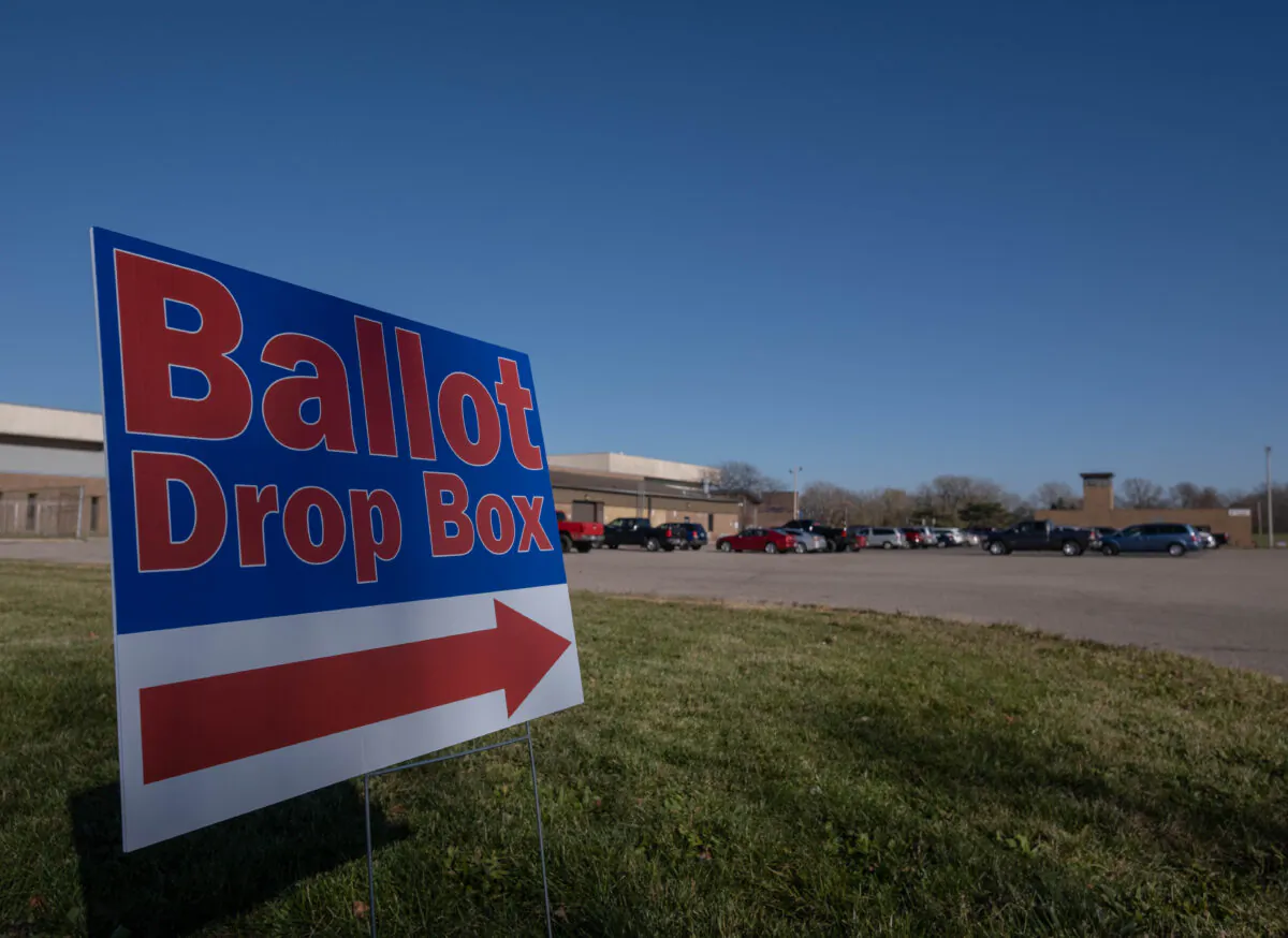 A sign pointing in the direction of a ballot drop box in Michigan on Nov. 3, 2020. (Seth Herald/AFP via Getty Images)