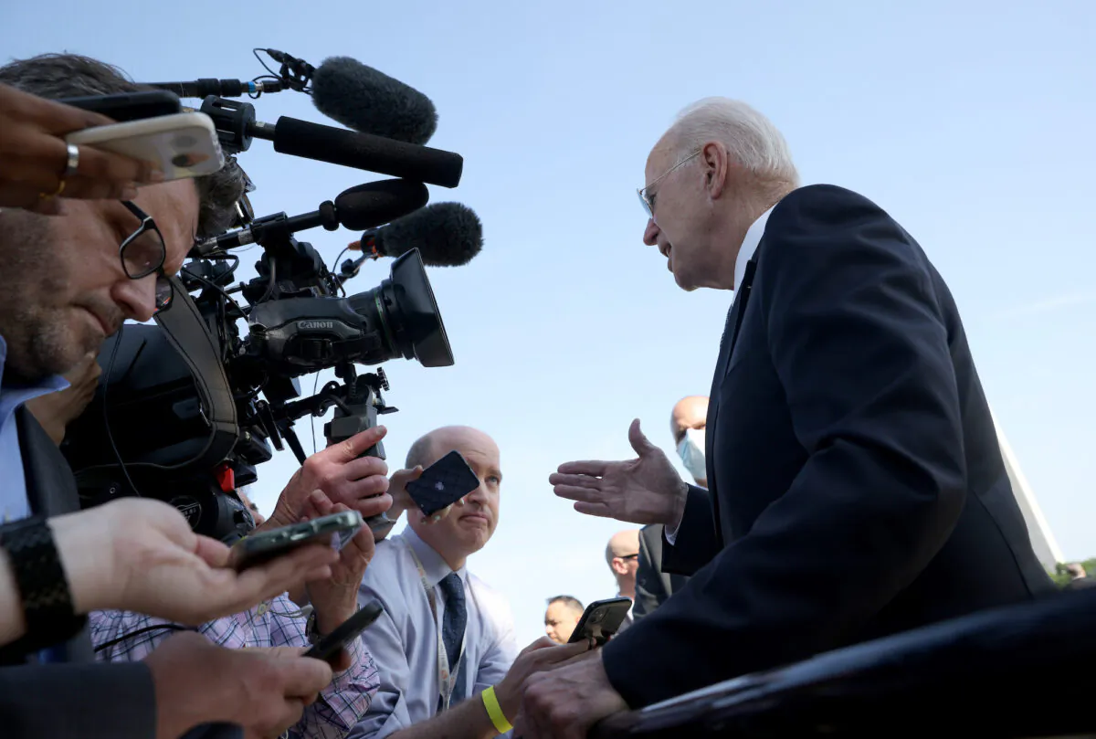 President Joe Biden answers questions from members of the press before departing from the White House in Washington on May 25, 2021. (Win McNamee/Getty Images)