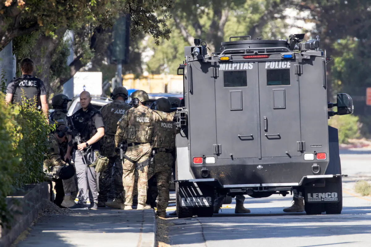 Police secure the scene of a mass shooting at a rail yard run by the Santa Clara Valley Transportation Authority in San Jose, Calif., on May 26, 2021. (Peter DaSilva/Reuters)